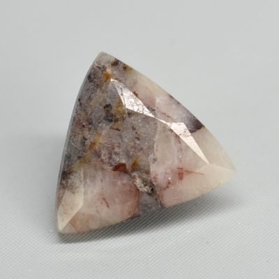 Gadolinite-yttrofluorite-2.21-ct.jpg